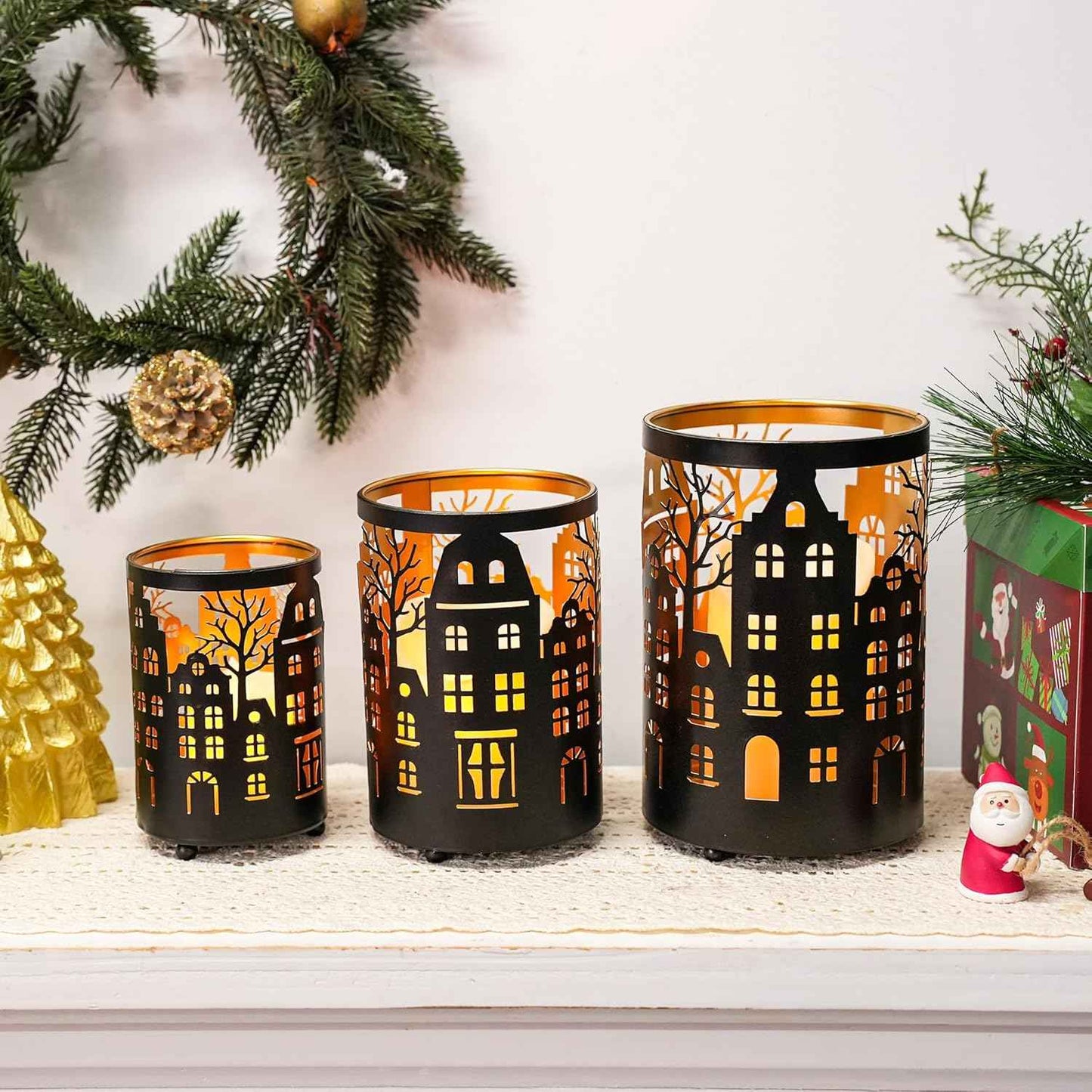 TRIROCKS Christmas Candle Lantern 7" H Etched Metal Candle Holder Christmas Decorations for Living Room Kitchen Tabletop Parties Patio Outdoors Indoors(3PCS;Bronze House)