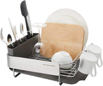 Compact kitchen dish rack with angled drainboard and removable flatware caddy