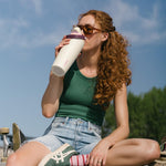 Insulated stainless steel water bottle with two-way spout and built-in straw