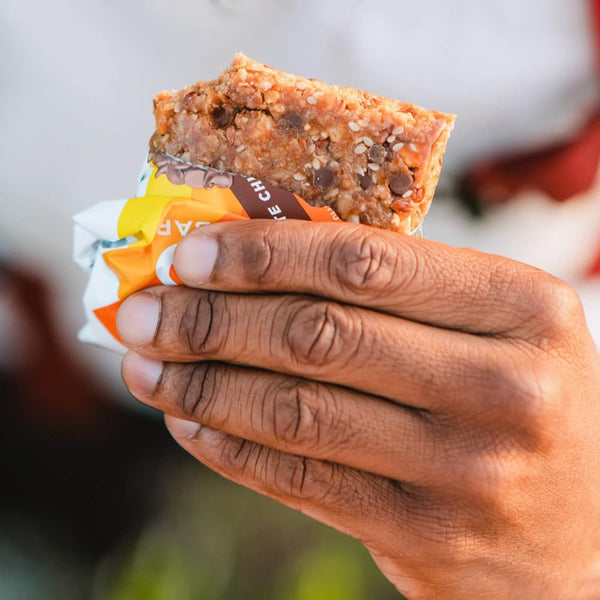 Plant-based meal replacement bar with whole food ingredients, oats, nuts, and seeds