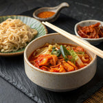 Spicy fermented kimchi napa cabbage in convenient pouches for ramen and stir-fries