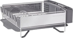 Compact kitchen dish rack with removable flatware caddy and angled drainboard