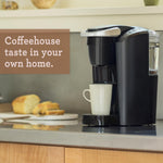 Compact single-serve K-Cup pod coffee maker with 3 brew sizes and smart start feature