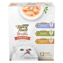purina fancy feast adult cat food toppers 12-pack with real salmon and whitefish creamy broth