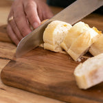 Acacia wood cutting board and serving board with handle for kitchen and dining