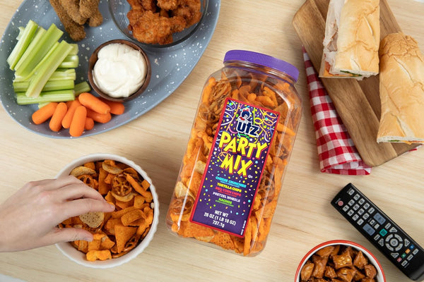Utz Party Mix snack mix includes corn tortillas, pretzels, and cheese curls, 1.62 pounds, resealable container