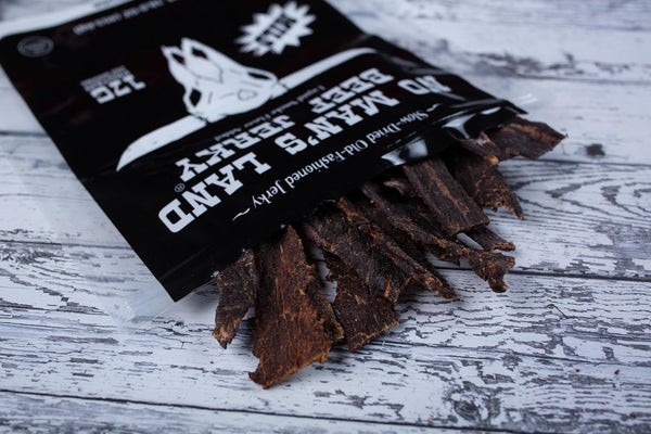 No Mans Land Slow-Dried Beef Jerky, Smoked & Seasoned Jerky Strips, High Protein, Low Carb Beef Snack, Gluten Free