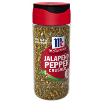 McCormick Crushed Jalapeño Pepper, 1.37 oz, bold flavor and moderate heat.