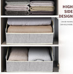 Large closet shelf organizer with fabric storage bins and handles