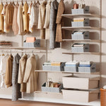 Large closet shelf organizer with fabric storage bins and handles