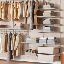 Large closet shelf organizer with fabric storage bins and handles