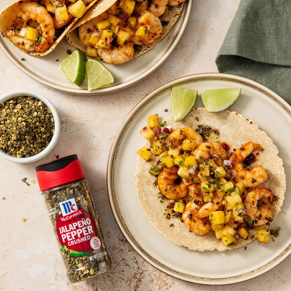 McCormick Crushed Jalapeño Pepper, 1.37 oz, bold flavor and moderate heat.